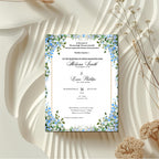 blue floral islamic wedding invitation with botanical border and elegant nikah ceremony design