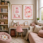 Set of two pink goose nursery wall prints displayed above a children’s desk in a cosy bedroom reading nook, styled with bookshelves, fairy lights, pink seating, soft cushions, teddy bear, plants and warm neutral decor.