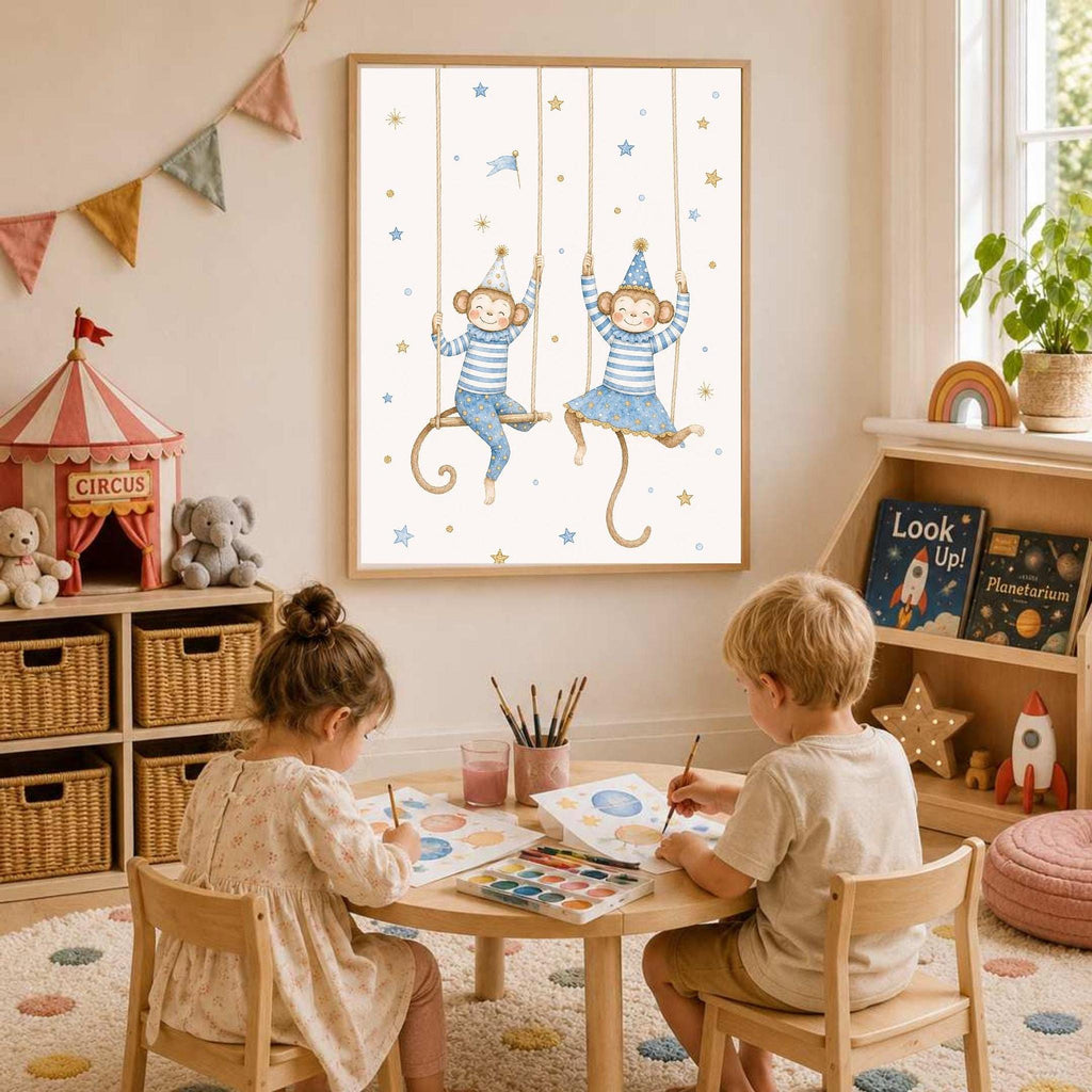 A framed print of two swinging monkeys hangs on a wall above a child s desk filled with art supplies.