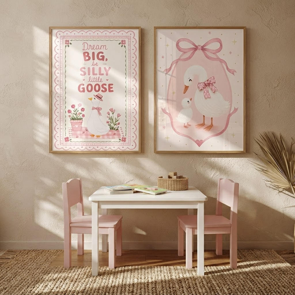 A playroom setting with a small table, pink chairs, and the two goose nursery prints on the wall.