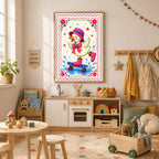 A framed art print of a cartoon duck wearing a pink hat, bow, and polka-dot boots while skateboarding on water, mounted on a wall above a child's wooden play kitchen in a decorated playroom.
