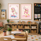 Two framed prints featuring a skateboarding duck and a dancing duck with a disco ball, hanging side by side.