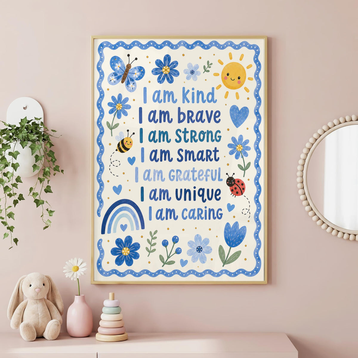 An affirmation poster for kids featuring positive statements surrounded by blue flowers, a sun, and a rainbow, hanging on a pink wall above a child's desk.