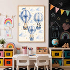 Kid study room with a framed blue hot air balloon poster centered above a white desk, flanked by a chalkboard wall and colorful storage cubbies.