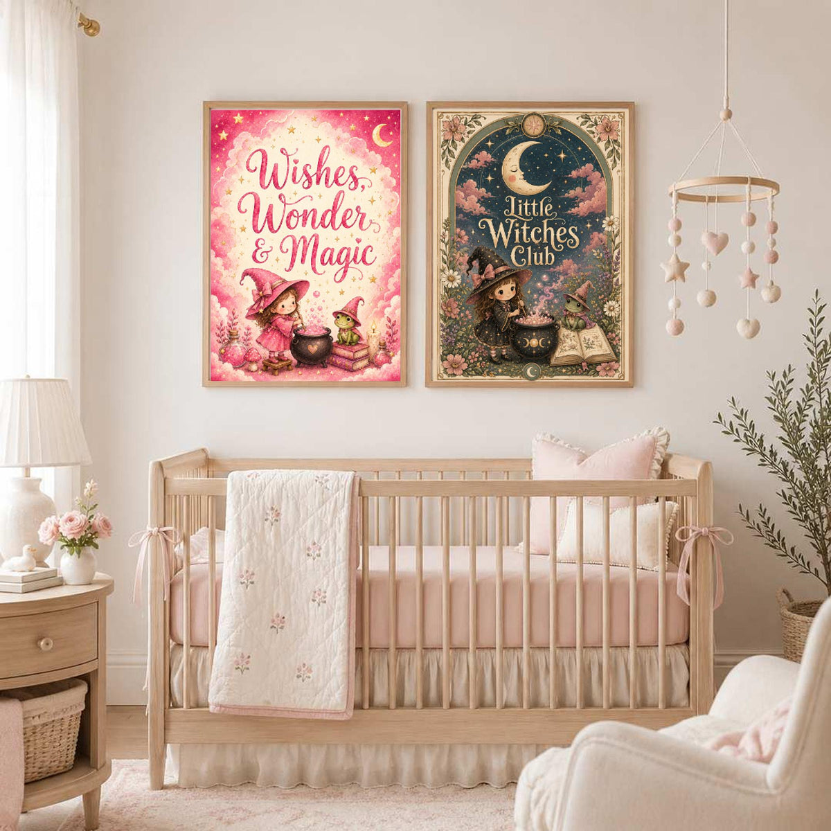 Two framed witch-themed art prints hanging side by side on a wall above a baby crib in a nursery.