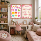 A framed basic shapes poster and a framed alphabet poster hang on a wall above a desk and a daybed in a bedroom.