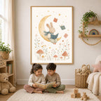 A framed art print of a bunny on a moon hangs on a wall above two children sitting on a rug and reading a book.