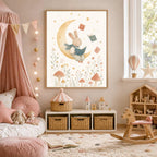 A framed watercolor print of a bunny reading on the moon is mounted on a wall above a cubby shelf in a nursery room.