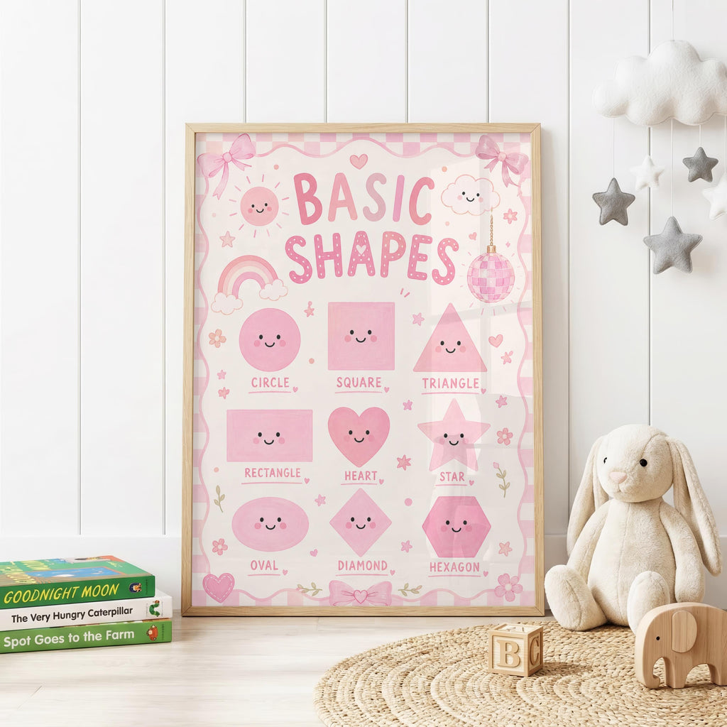 Pink educational shapes nursery print featuring smiling circle, square, triangle, rectangle, heart, star, oval, diamond and hexagon shapes with bows, flowers and playful pink details.