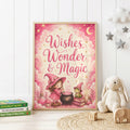Pink magical nursery wall print featuring the words Wishes, Wonder & Magic with a little witch stirring a cauldron beside a frog, surrounded by potion bottles, books, stars and a crescent moon.