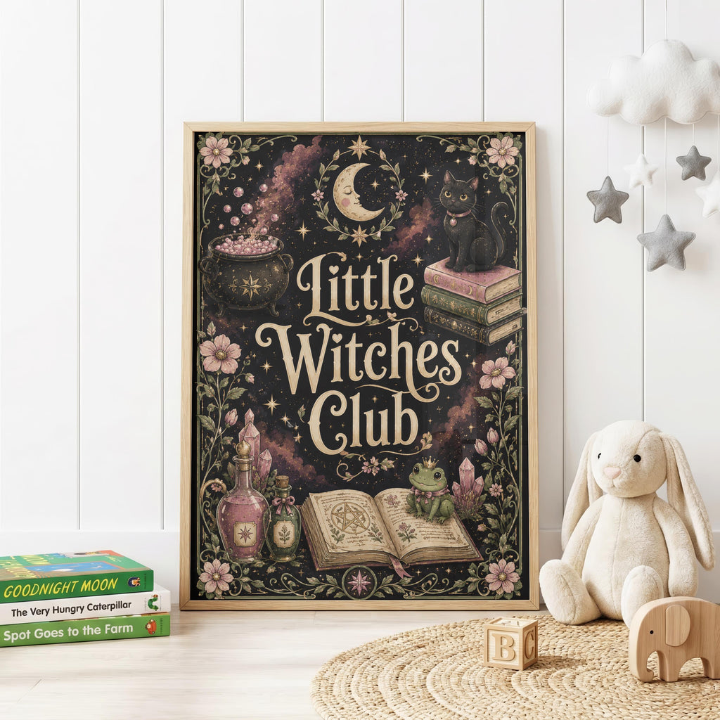 Little Witches Club children's wall print on a black background featuring a crescent moon, black cat, frog, bubbling cauldron, magical books, potion bottles, crystals, pink flowers and golden stars.