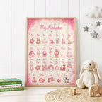 Pink educational alphabet nursery print featuring uppercase and lowercase letters A to Z with illustrated animals and objects, set against a soft cream and pink background with clouds and golden stars.