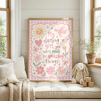 Pink girls nursery wall print featuring the quote My darling girl, you were made for amazing things, surrounded by a smiling sun, pink aeroplane, butterflies, hearts, flowers, stars and a pink gingham border.