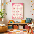 A pink alphabet poster hangs centrally on a wall above a low shelving unit holding toys and books.
