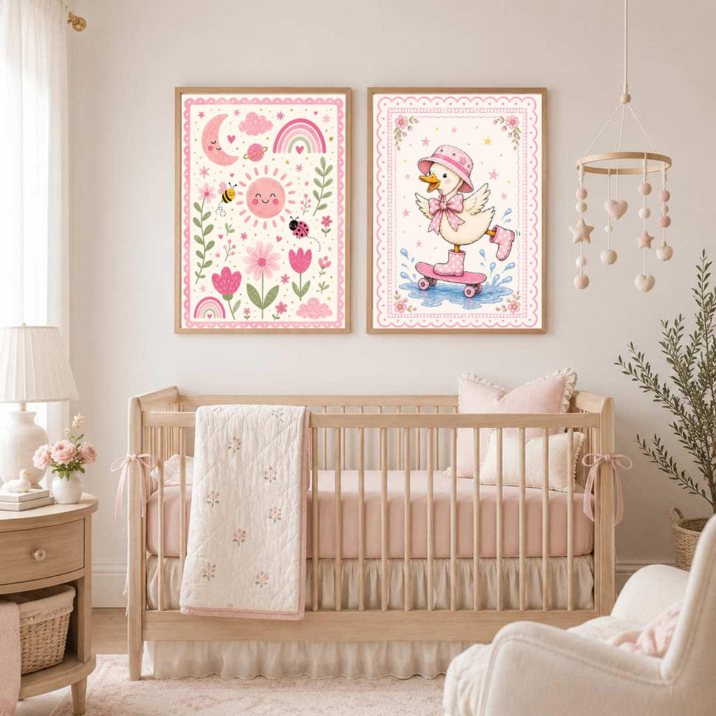 Two framed prints featuring a pink botanical scene and a skateboarding duck displayed above a baby crib.