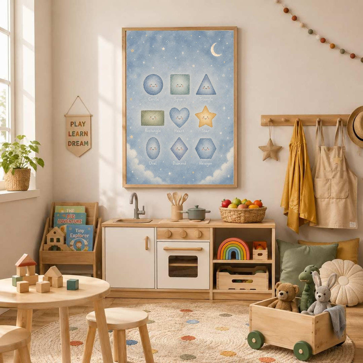 A framed watercolor shapes educational poster hangs on a wall in a brightly lit playroom with toys and a children table.