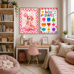 Two prints, a dancing duck and a shapes chart, hang on the wall above a child's desk and pink daybed.