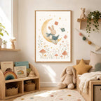 A framed watercolor print of a bunny on the moon is displayed on a wall above a child toy shelf and bed.