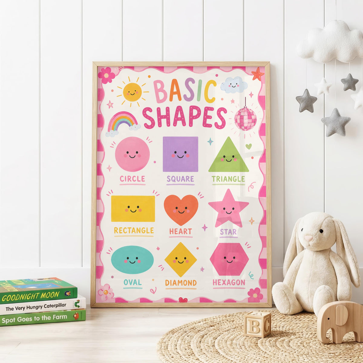 Colourful educational shapes nursery print featuring smiling circle, square, triangle, rectangle, heart, star, oval, diamond and hexagon shapes with a rainbow, sunshine, clouds, flowers and pink disco ball.