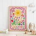 Colourful girls nursery wall print featuring the quote I love you more than the sun, moon and all of the stars, with a smiling sun and moon, butterflies, flowers, hearts, rainbow and pink gingham border.